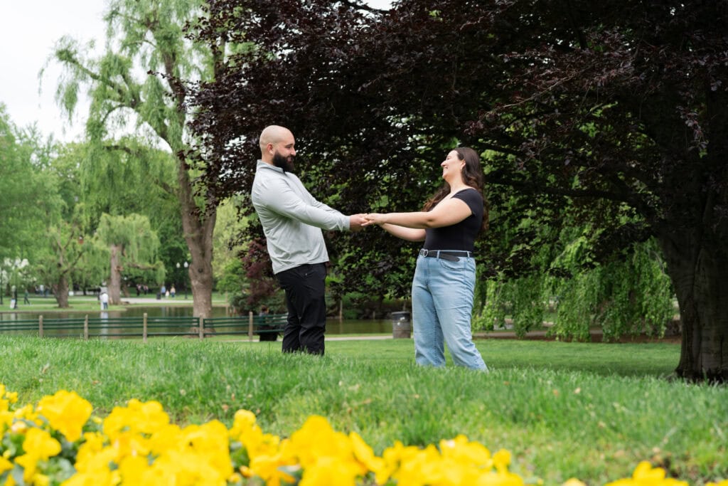 surprise proposal at the Boston Public Garden capturing nature and candid moments