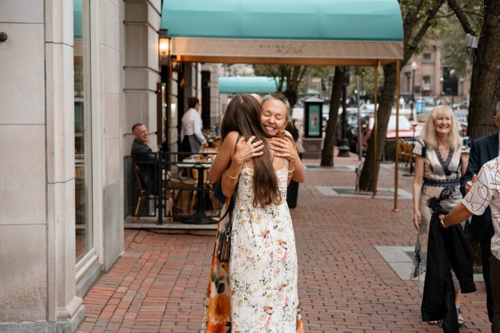 Event photography and engagement celebration at restaurant in Boston