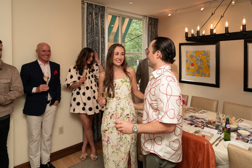 Event photography and engagement celebration at restaurant in Boston capturing genuine emotion