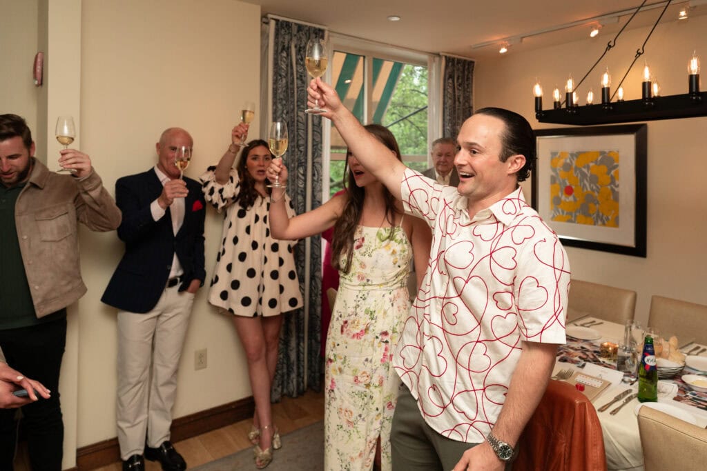 Event photography and engagement celebration at restaurant in Boston capturing genuine emotion